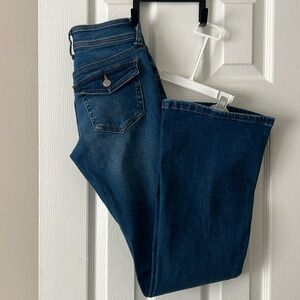 Low rise flare jean. Dark wash. Size 000